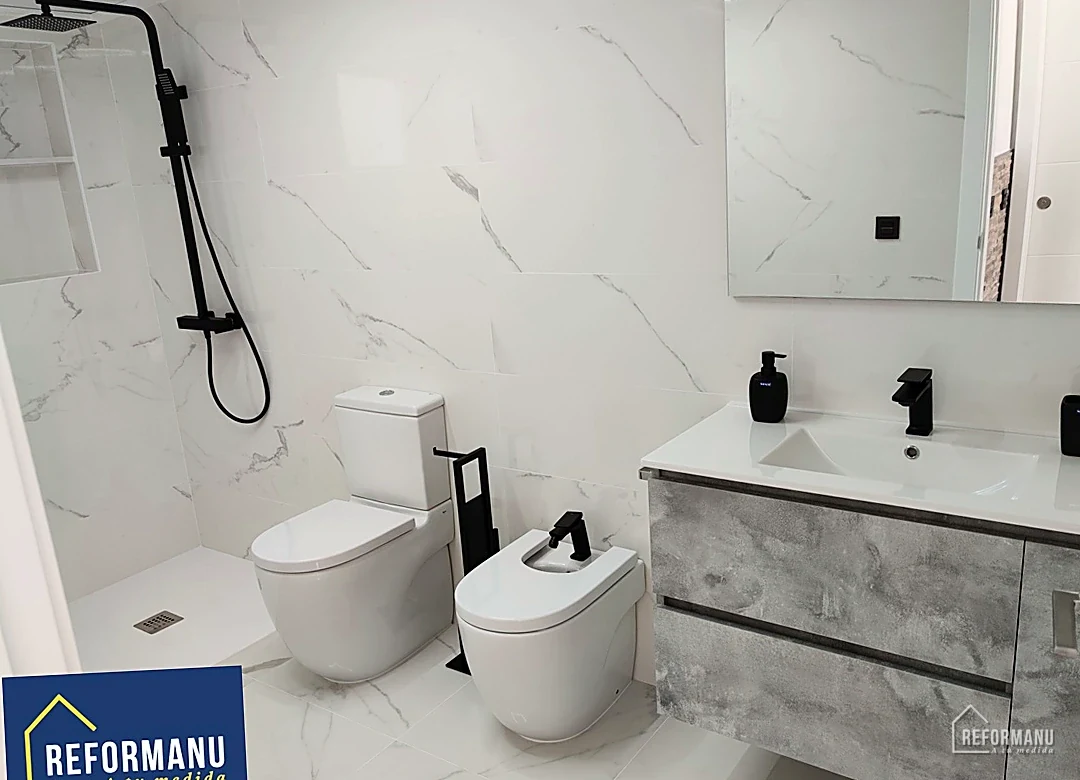 White marble bathroom with black fittings