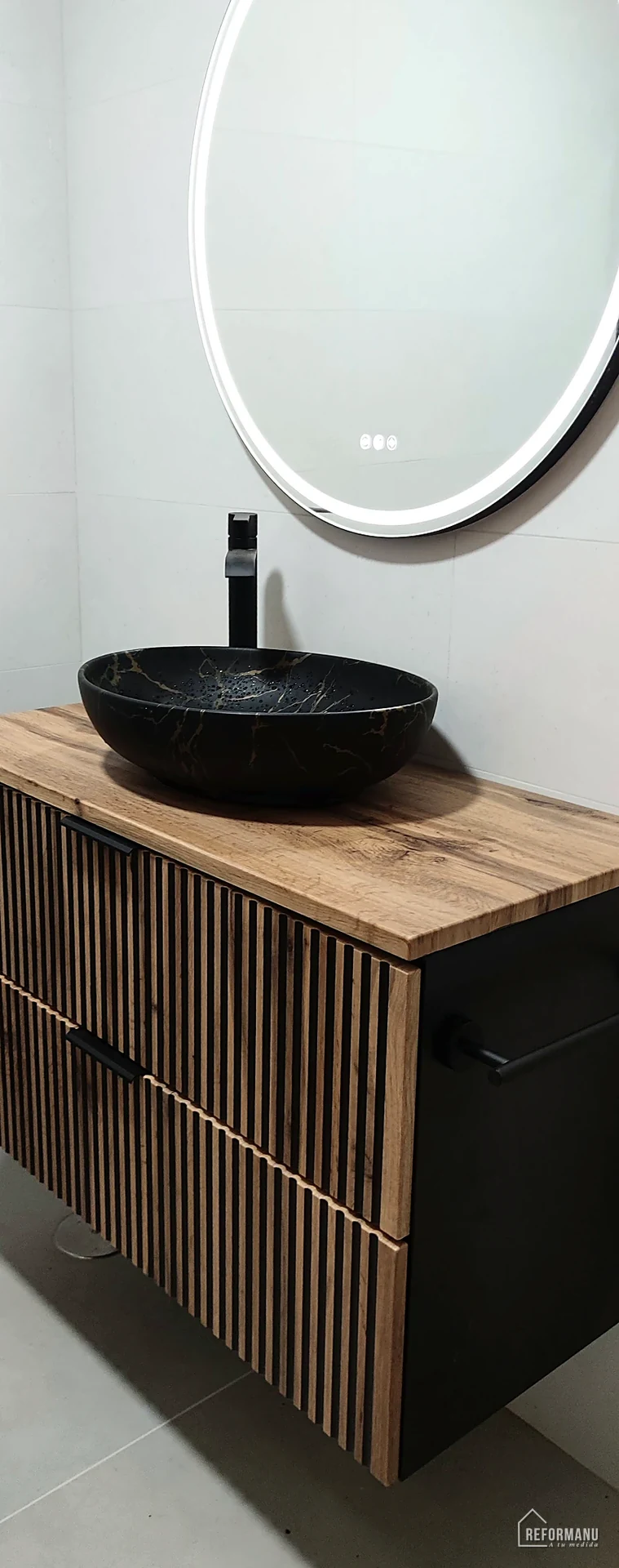 Modern black bathroom with marble